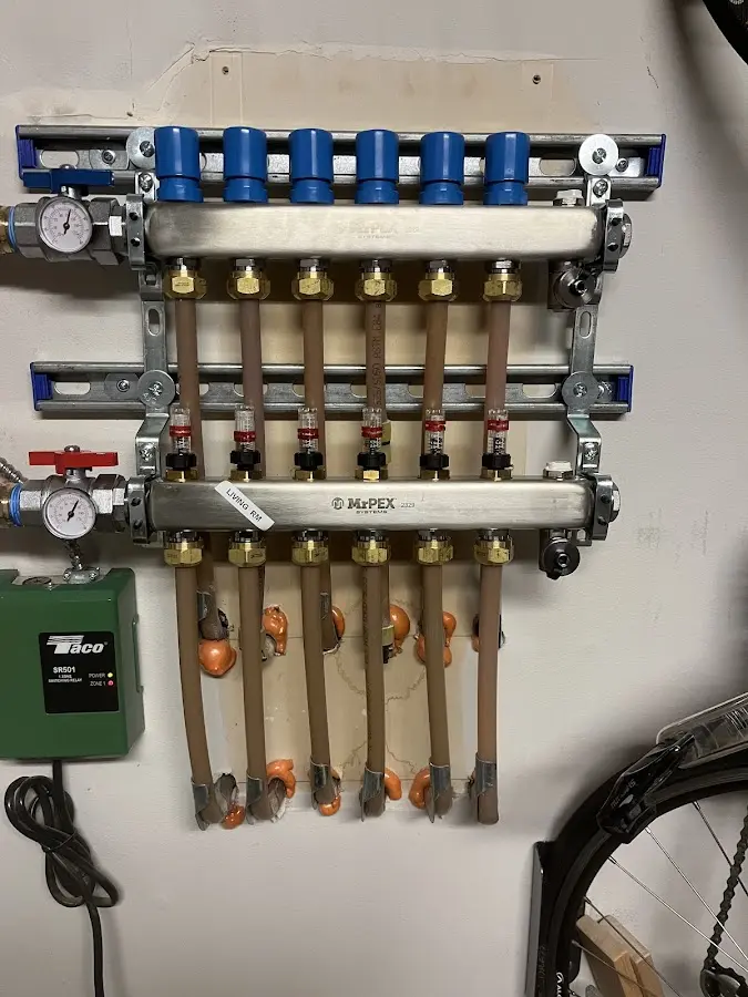 Plumber performing Water Heater Repair at a residential property in Northvale